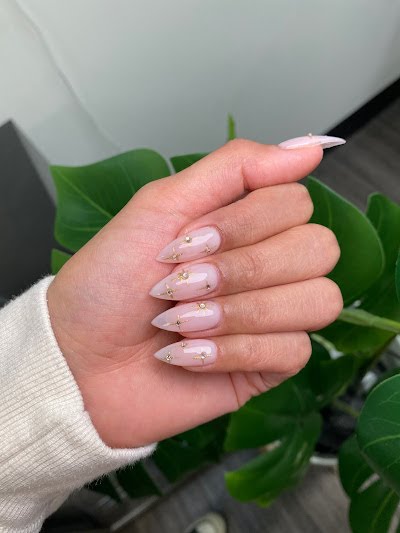 Soft nude manicure with delicate gold details